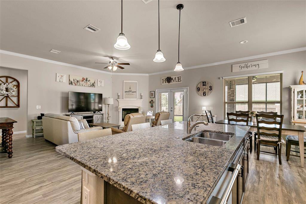 Birds eye view of the open concept living with lots of windows providing great natural lighting.