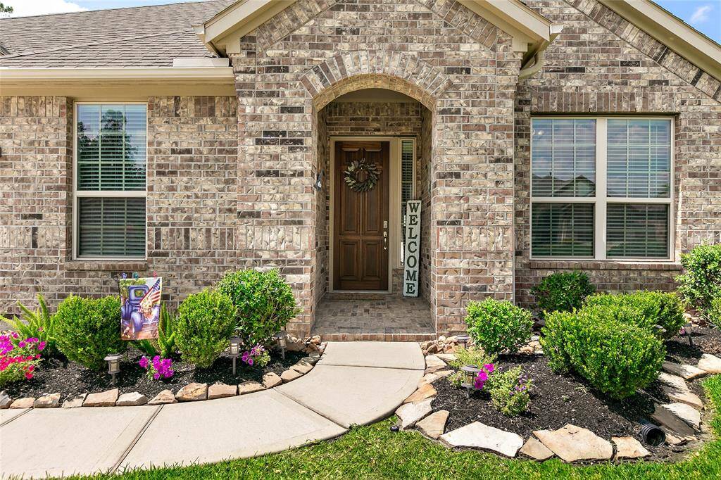 Cozy and inviting covered front entry.