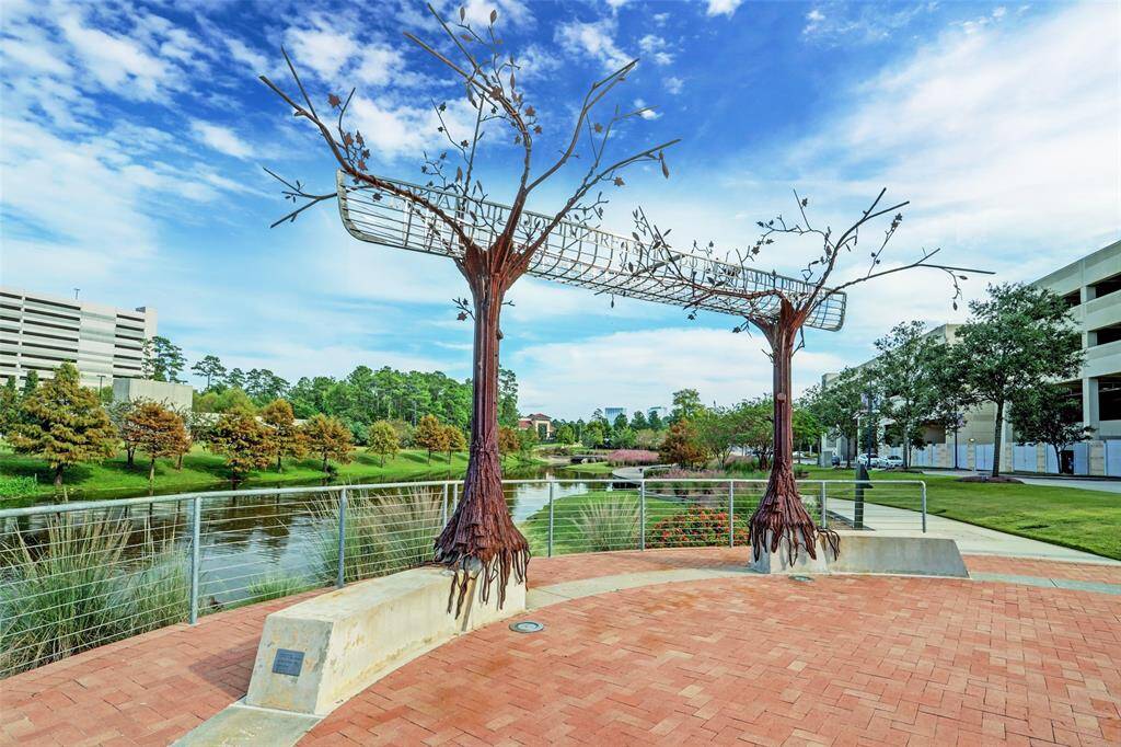 Art installations and green spaces are thoughtfully placed throughout, adding personality and charm. Whether you're catching up with friends, running errands, or just enjoying the outdoors, Hughes Landing delivers an effortless blend of convenience and community.
