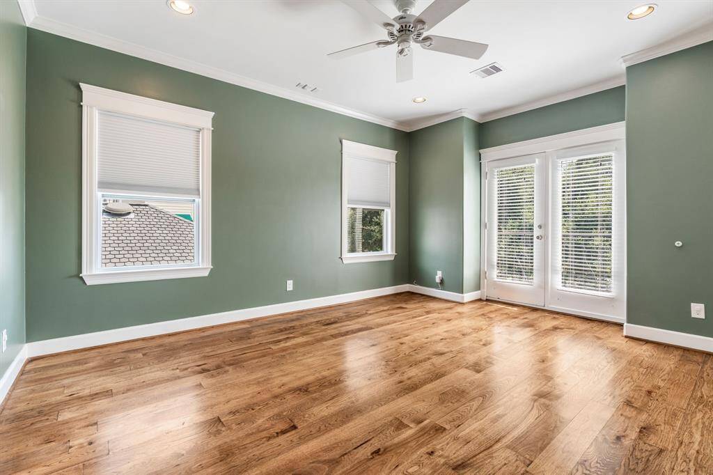This secondary room offers a Juliet balcony.