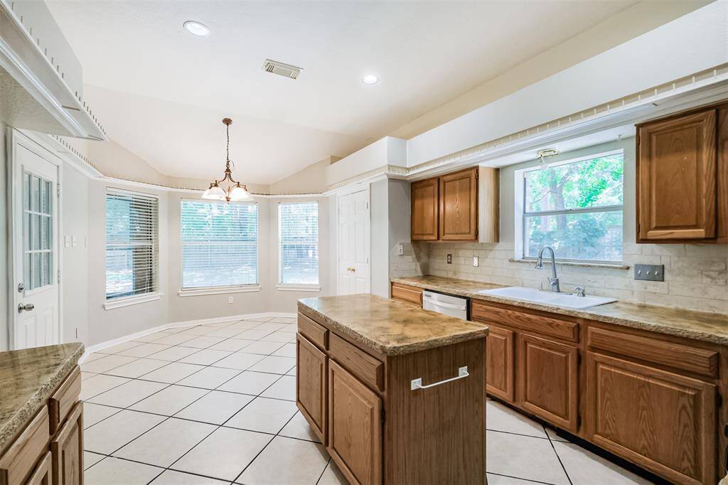 Kitchen features a central island for added workspace
