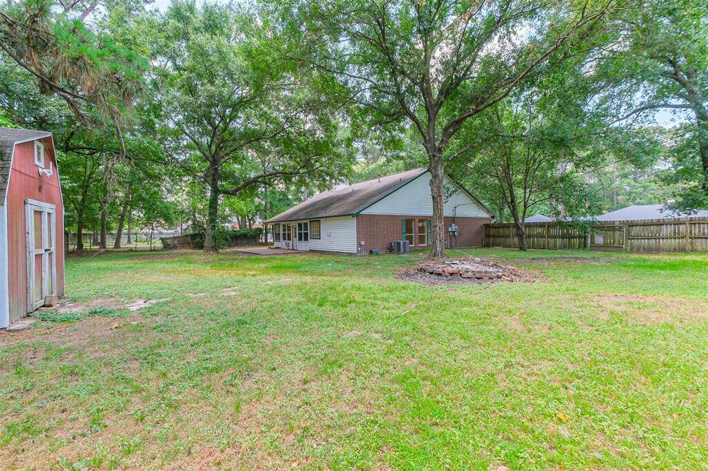 Large backyard offers plenty of space for outdoor activities and gatherings.