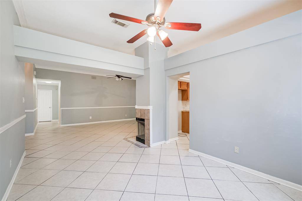 Spacious dining area with room to host family and friends comfortably.
