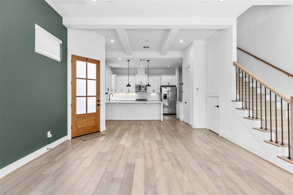 Notice the Beautiful Engineered Wood Floors giving a Light and Airy Feel