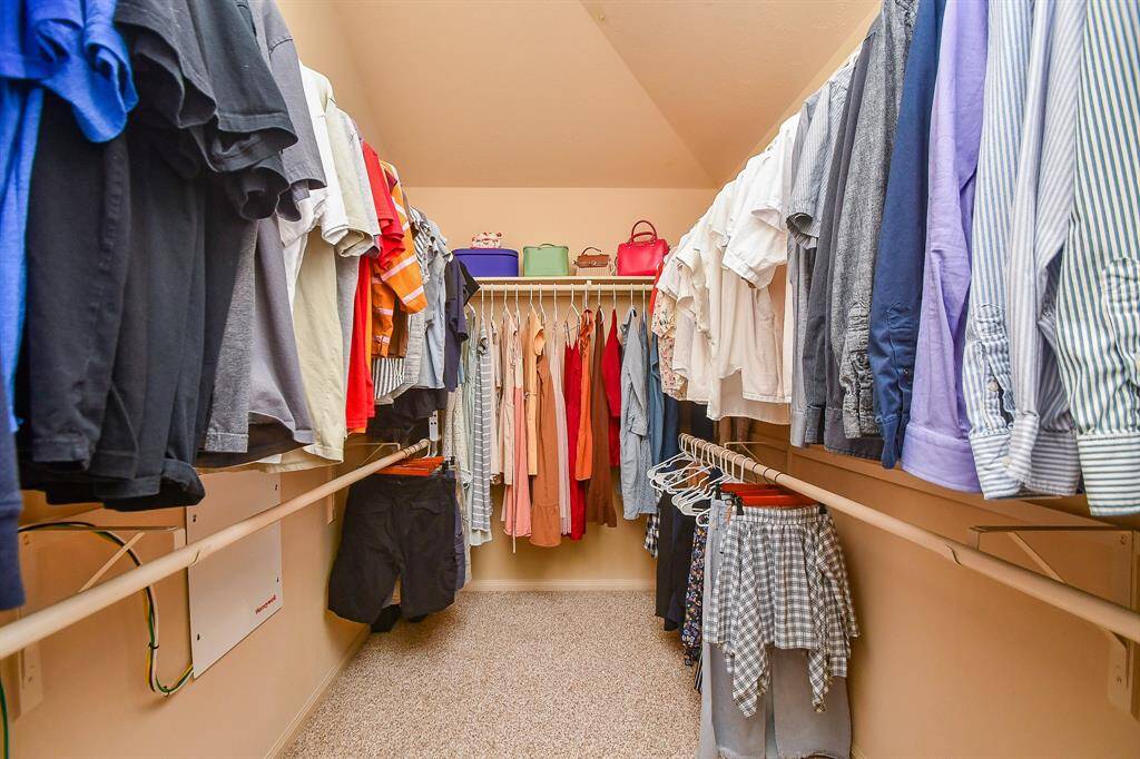 Oversized walk-in closet in the primary suite for ample storage.