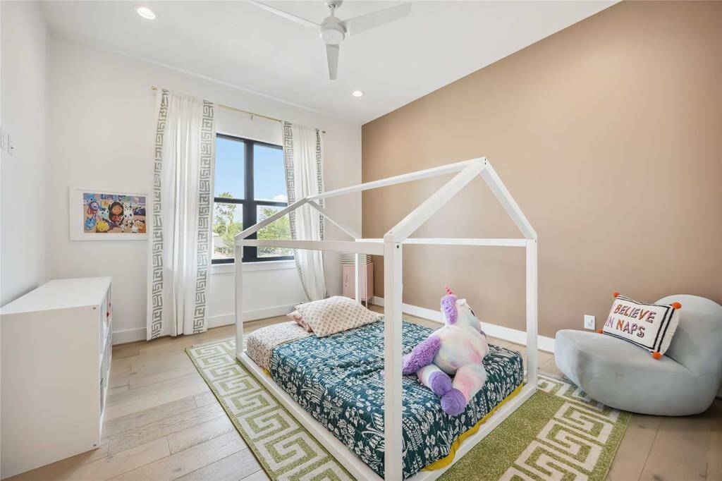This well-proportioned bedroom includes a private bath with a classic tub/shower combo—perfect for guests or extended stays.