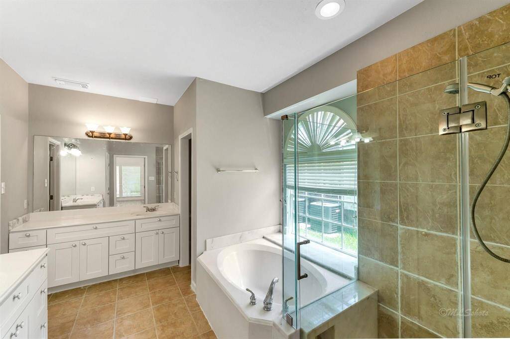 Primary Bathroom with Shower and Tub Combo