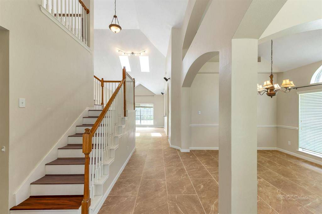 Foyer with High Ceilings