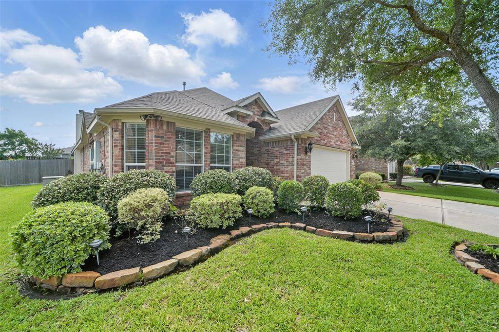 Mature landscaping and a sprinkler system