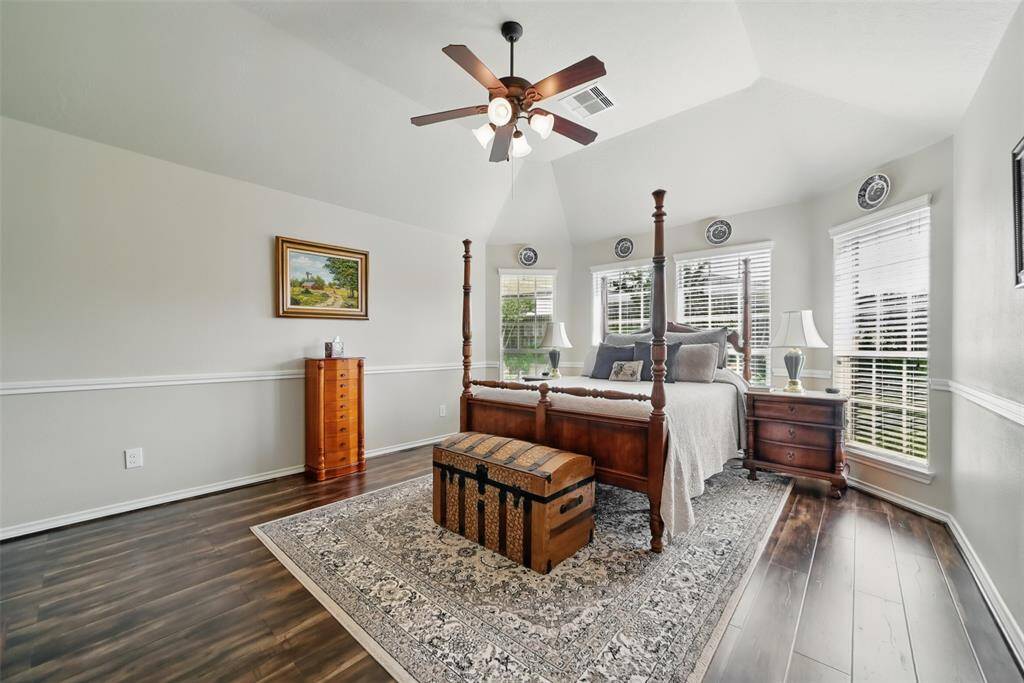 High ceilings are a bonus in the primary bedroom