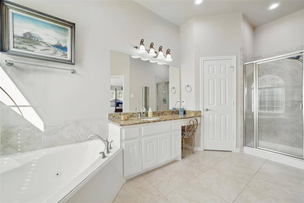 Primary ensuite has two sinks and a vanity area