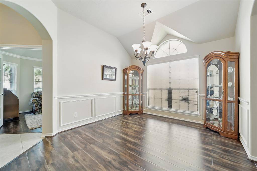 Dining room with wood flooring
