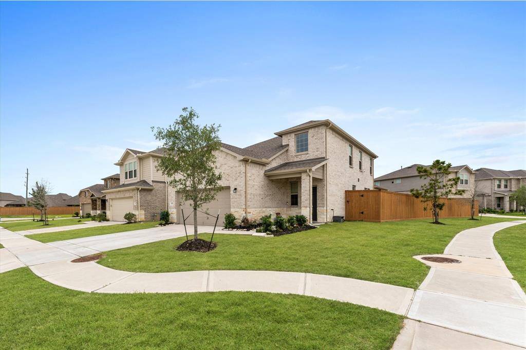 Situated on a corner lot offering extra space.