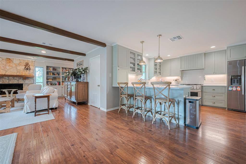 Imagine all the meals to be shared in this gorgeous brand new kitchen. Cabinets are all custom-built with inset doors, soft-close hinges, and painted in the loveliest sage green.