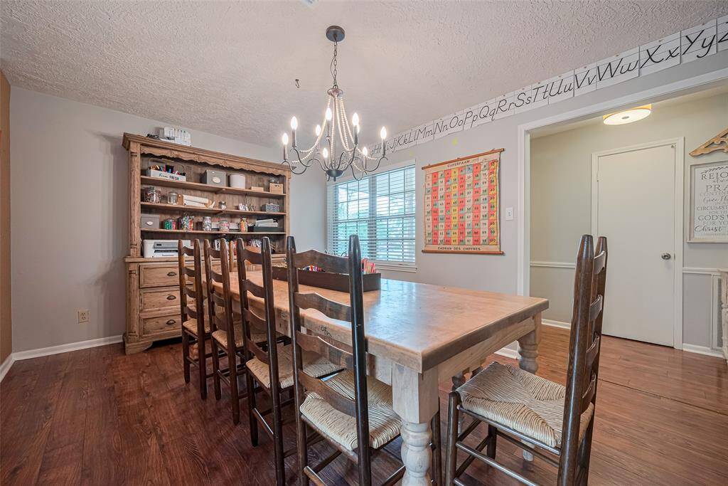 Located to the right of entry, overlooking the front porch, and packed with storage, this large (15x11) flex room is waiting to meet your every need.