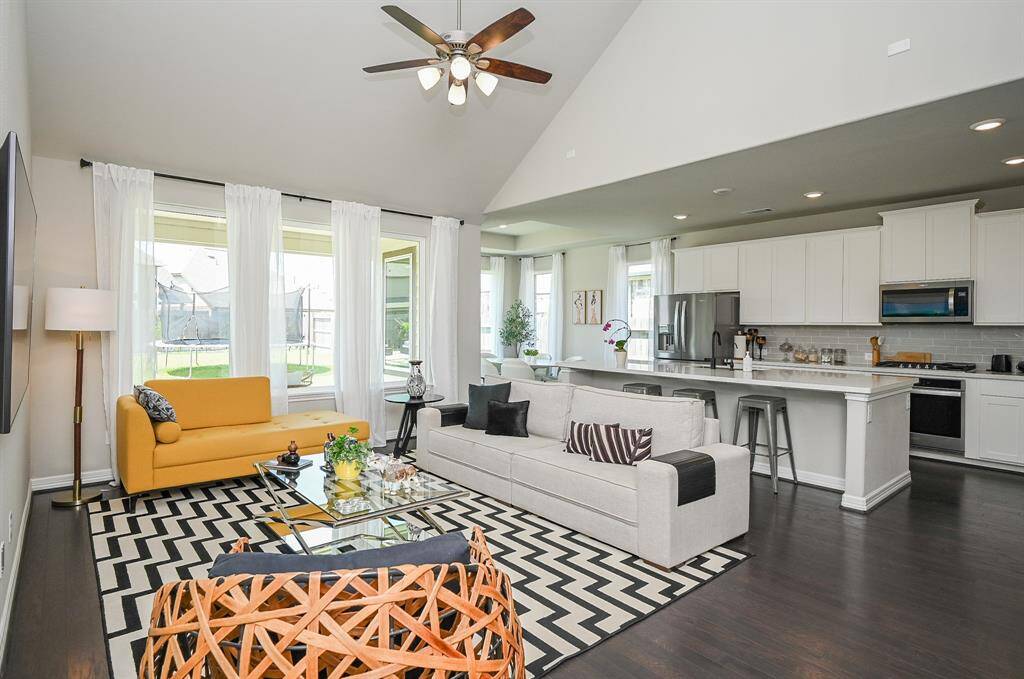 Spacious with cozy potential, the large living/family area shares space with the full chef's kitchen, all overlooking the patio/backyard.
