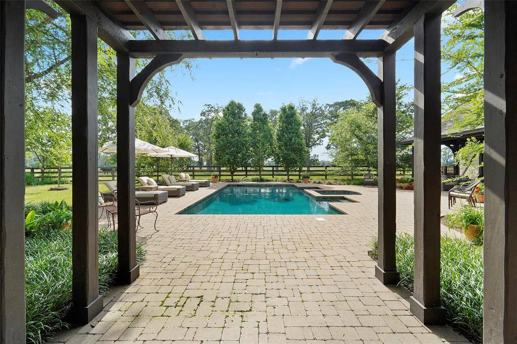 Outdoor living space just off the living room offers a seamless blend of indoor-outdoor living.