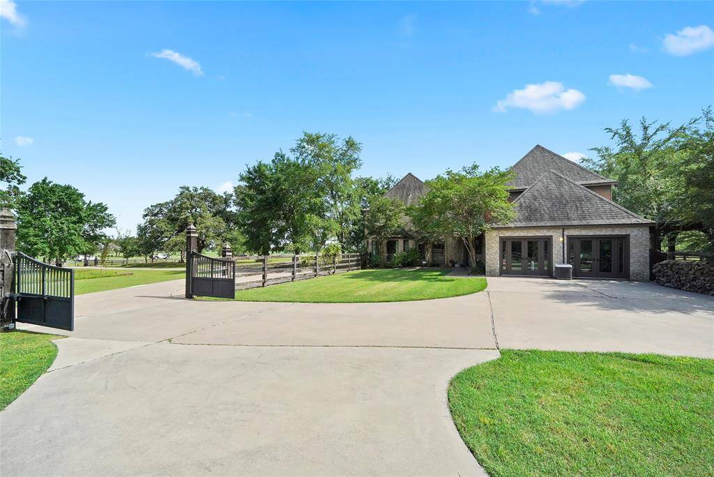 Oversized driveway offering plenty of parking space for guests or recreational vehicles.