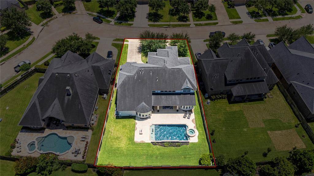 Another aerial photo of the home showcasing the back of the home.