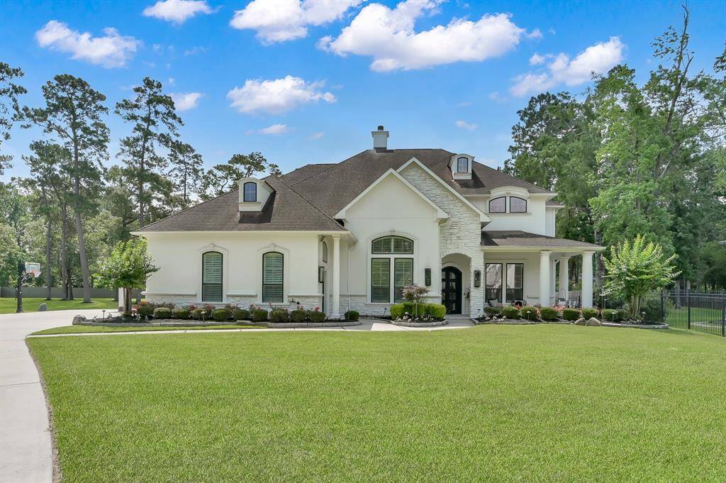 Welcome to your serene retreat featuring a charming Casita and a cozy covered front porch for relaxation.