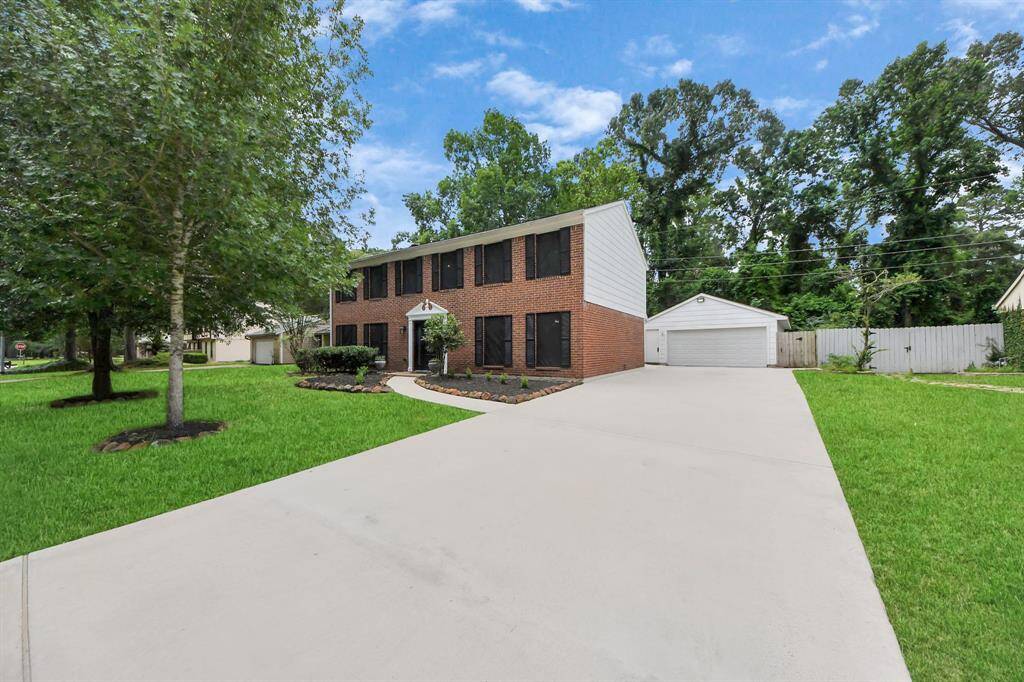 Over sized driveway that leads to your oversized garage.