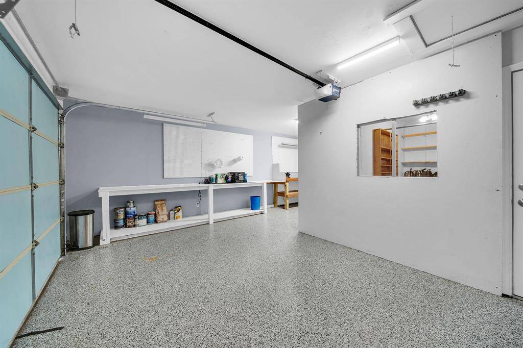 Epoxy floor garage with office added.