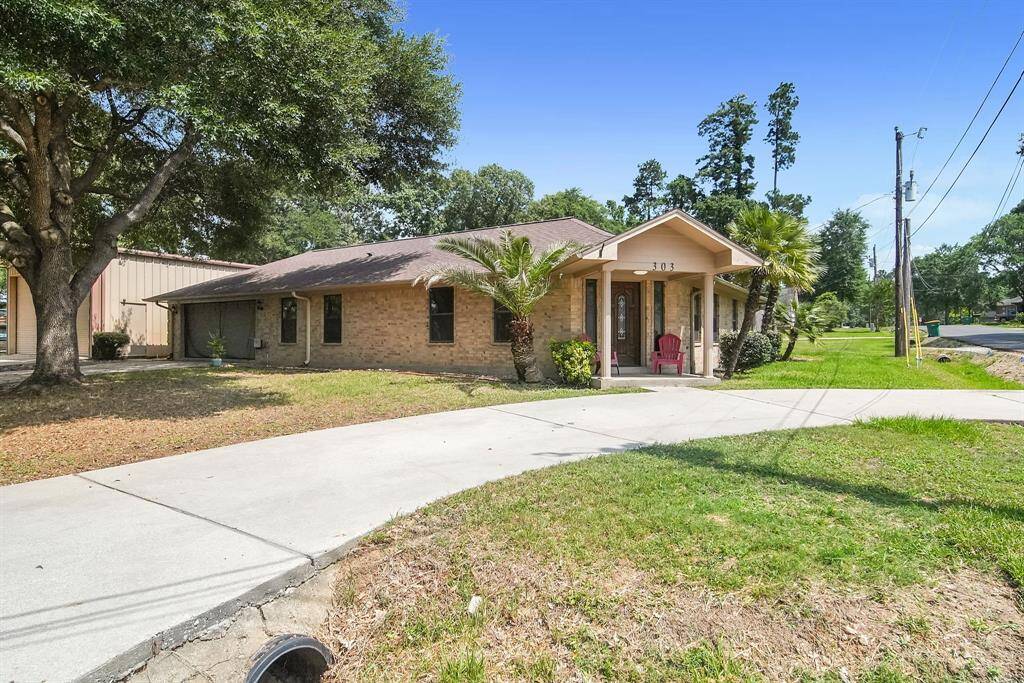Circular drive across the front of the home.
