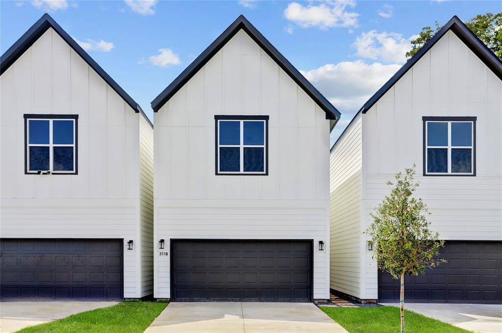 Photos are of 311-B Marcella - the model home, which has exactly the same finishes, but the floorplan is flipped. Each home has 2 car garage, long double wide driveway and sprinklers front and back. Oversized 21' X 18.5' garage fits 2 F-150s!