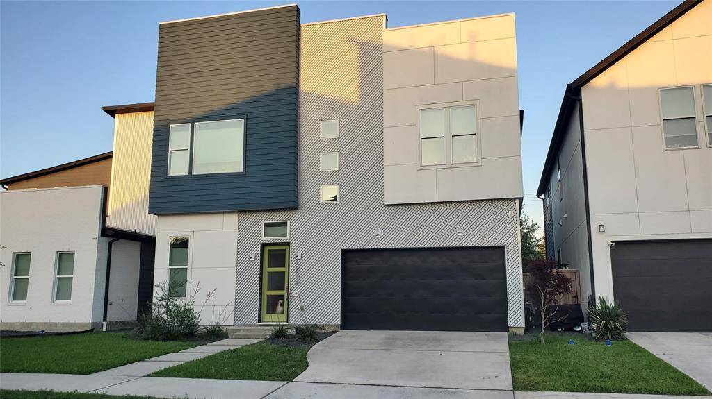 3308 Cardinal Crest Lane — Stunning modern home featuring a striking exterior with a blend of textures and colors. This spacious 4-bedroom, 3-full-bath residence includes a convenient first-level bedroom and full bath. Enjoy the attached 2-car garage and a generously sized backyard perfect for adding a pool!