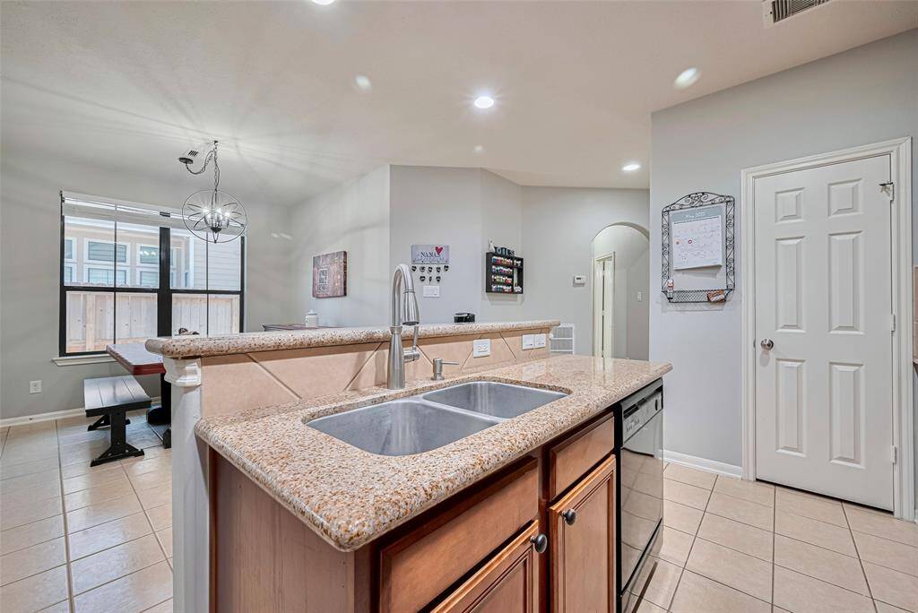Both secondary bedrooms and full bath are just off the kitchen.