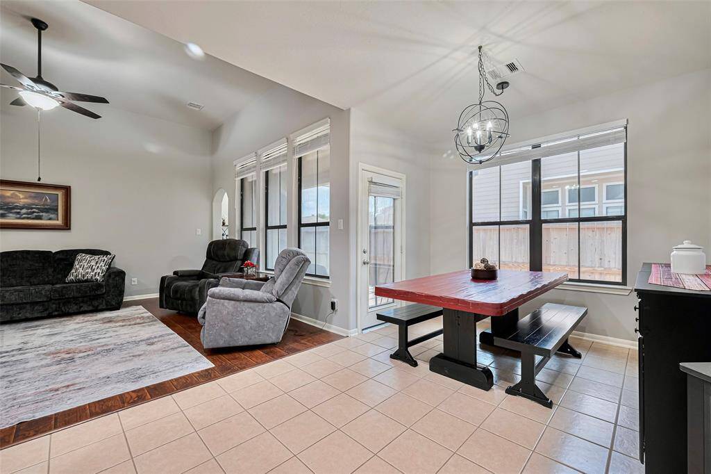 Notice the soaring ceilings and beautiful updated chandelier.