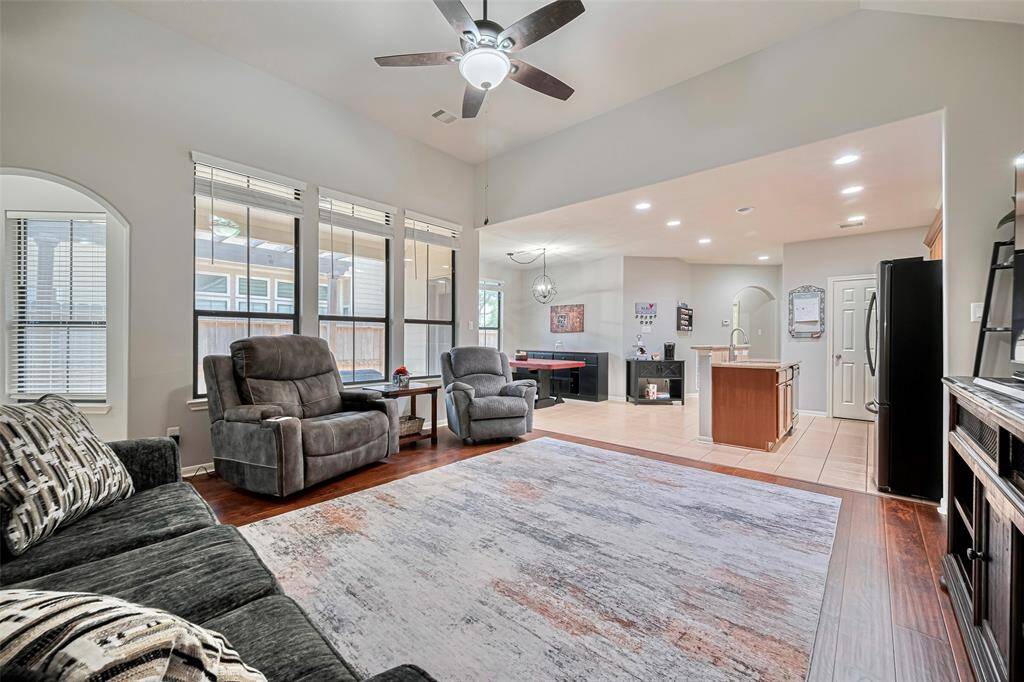 Very spacious living area with the back hallway leading to the utility room and tucked in primary retreat.