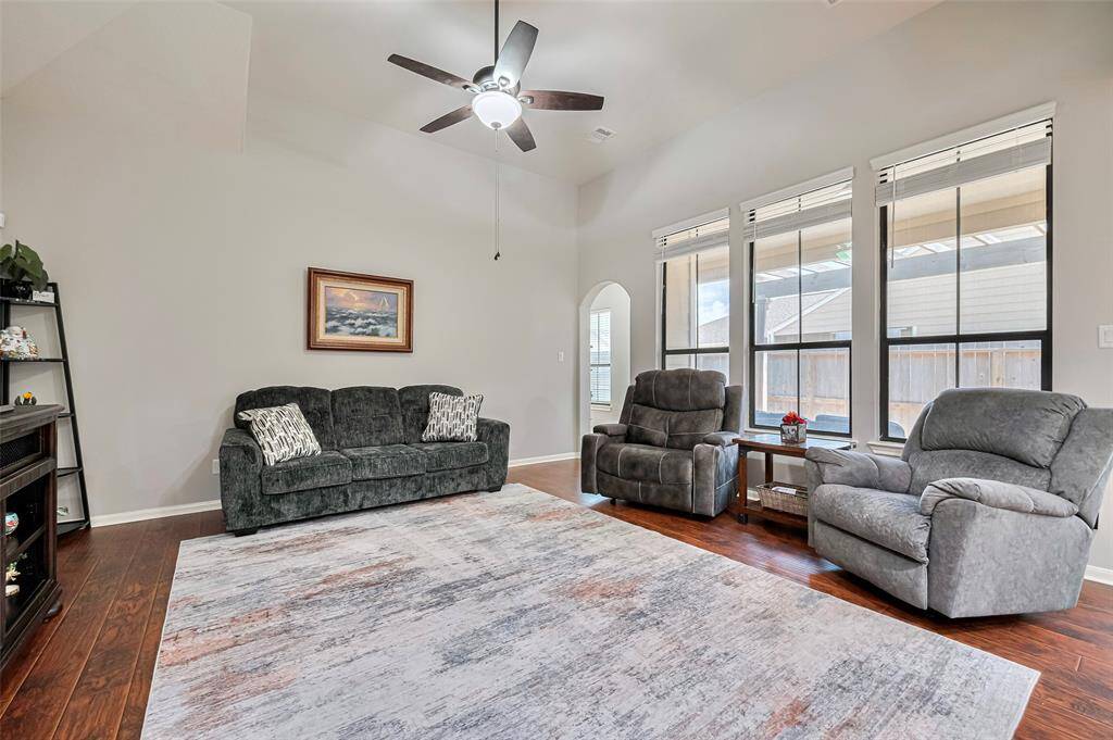 Behind the recliners is a covered patio.  The access door is just off the breakfast room.