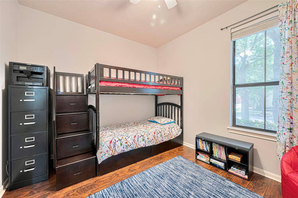 Large secondary bedroom faces the front yard.