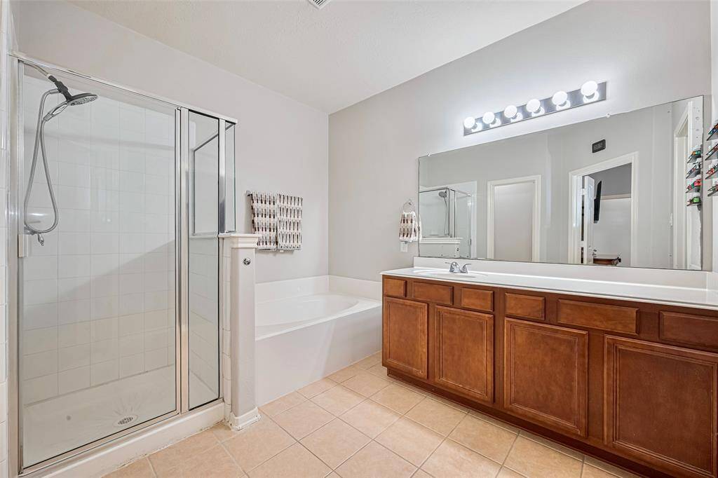 Stand alone shower and lots of counter space for all your essentials.