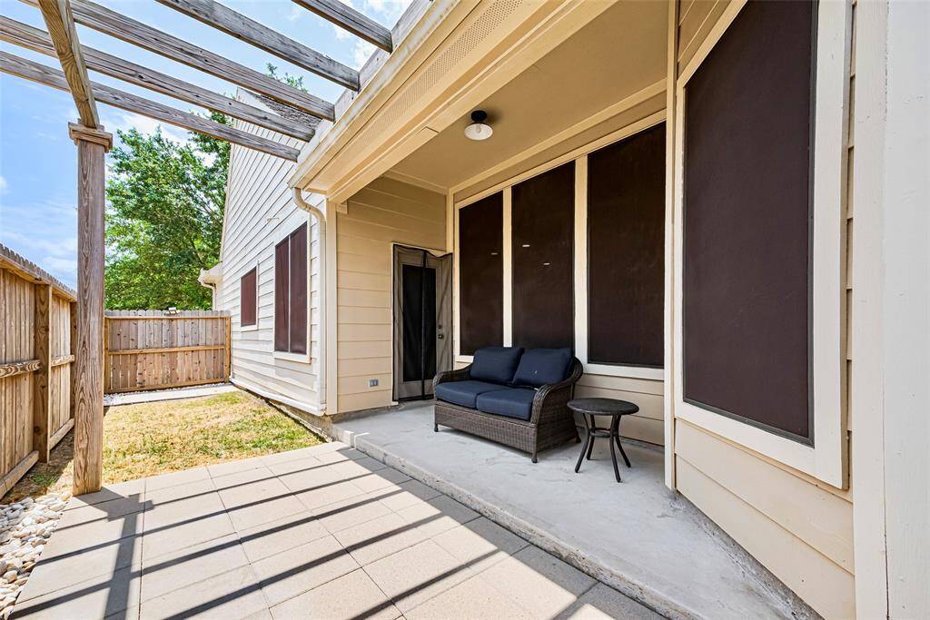 Best of both worlds with grass and also a low maintenance non-grass option.  Imagine some hanging ferns or colorful plants hanging overhead to really warm up your outdoor living space.