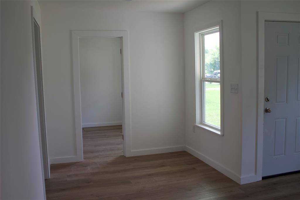 Living area with view to a bedroom