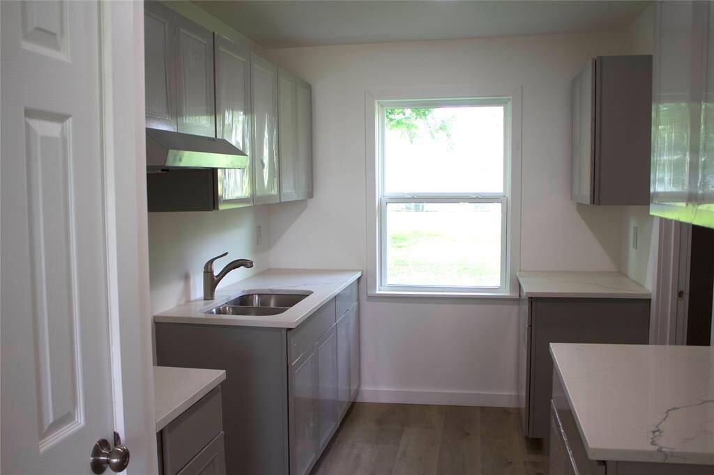 Updated kitchen with new cabinets and quartz countertops