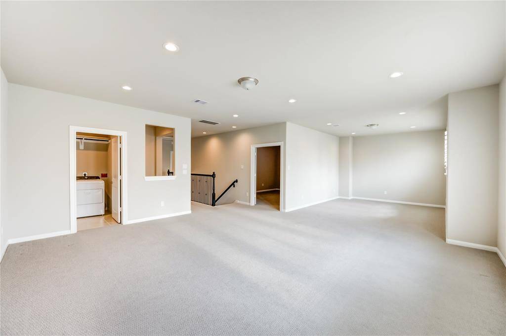 Large upstairs flex space . and Theater room, laundry, study space