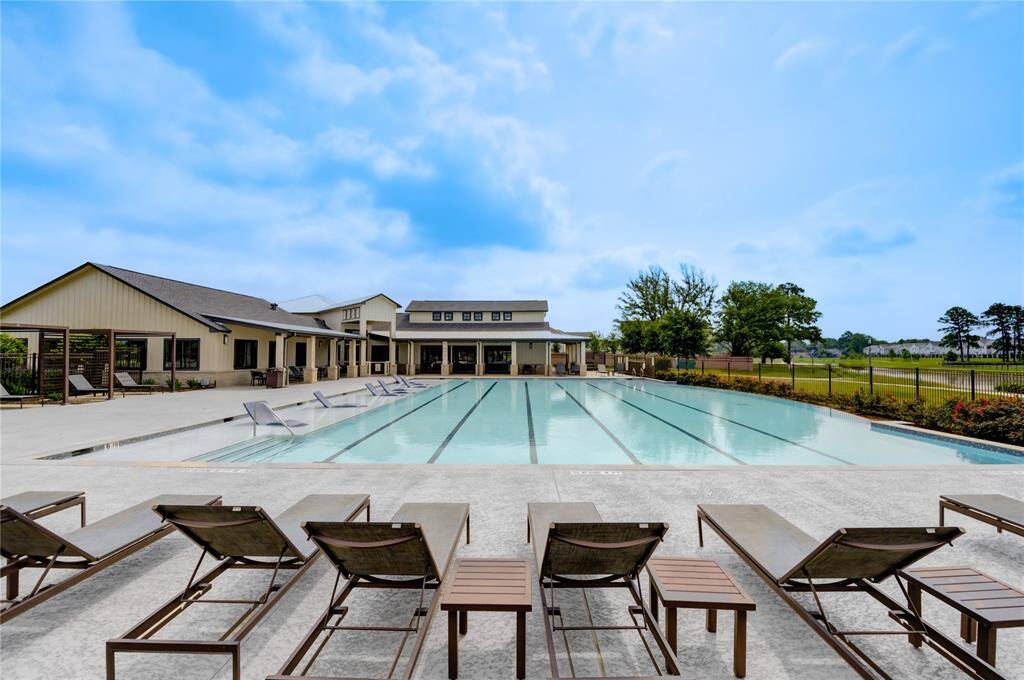 Community pool with fitness center and outdoor walking trail