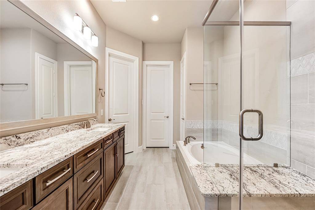 Primary bathroom with Shower and tub. Double vanity