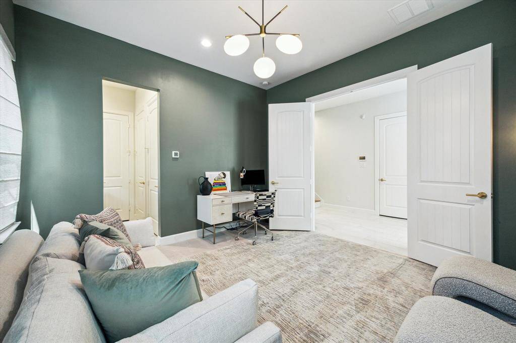 Alternate view of the downstairs bedroom (desk to stay unless otherwise requested)