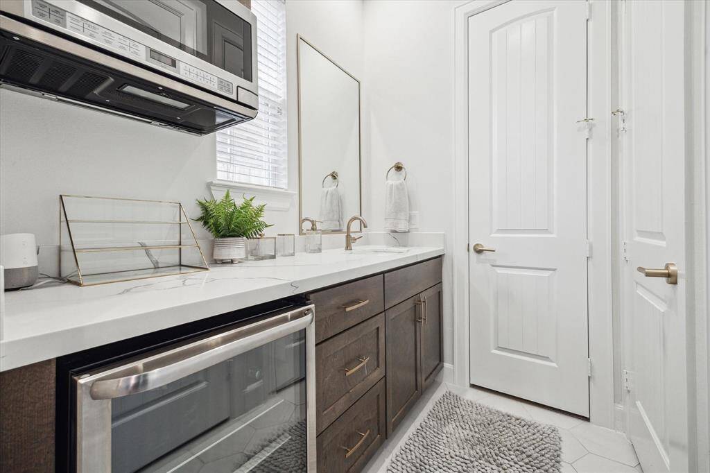 Downstairs ensuite includes a small beverage cooler and microwave - great for guests or that home office