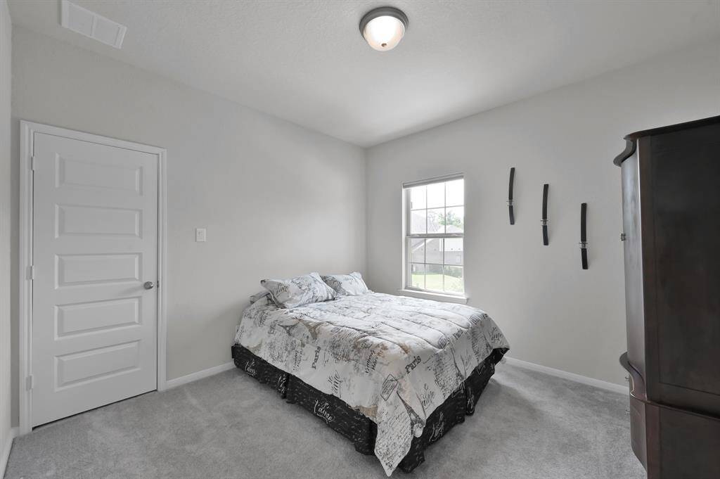 Secondary bedroom #2 offers a walk-in closet.