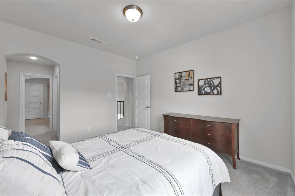 Secondary bedroom #3 offers an en-suite full bathroom.