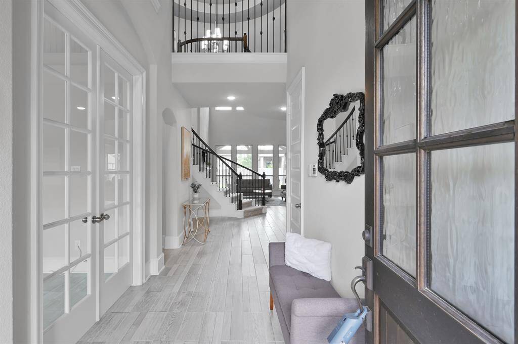 This thoughtfully designed residence offers 4 bedrooms, 3.5 bathrooms, a home office with French doors, media room, upstairs game room, dedicated dining room, a utility room that connects to the primary bedroom closet, and a two-car garage.