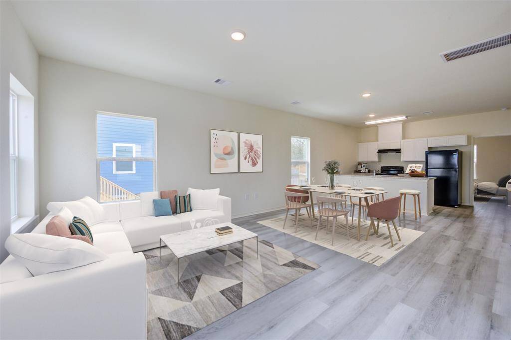 Living Room (Virtually Staged) Photo of Model Home - some finishes may differ