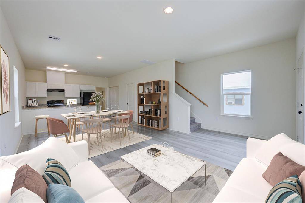 Living Room (Virtually Staged) Photo of Model Home - some finishes may differ