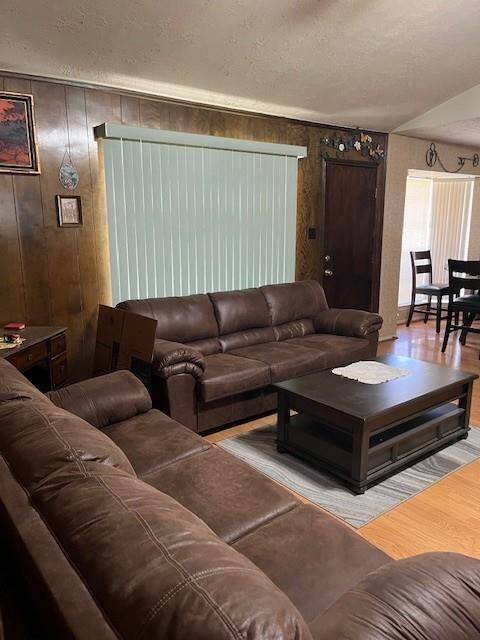 Large Open Living Area with a window to the back yard.
