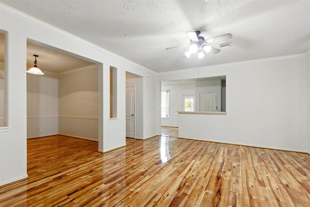 formal dining room going toward the kitchen and half bathroom